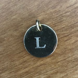 Gold “L” charm